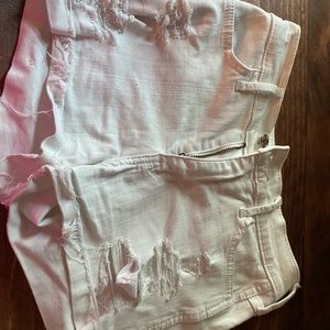 White ripped jean shorts